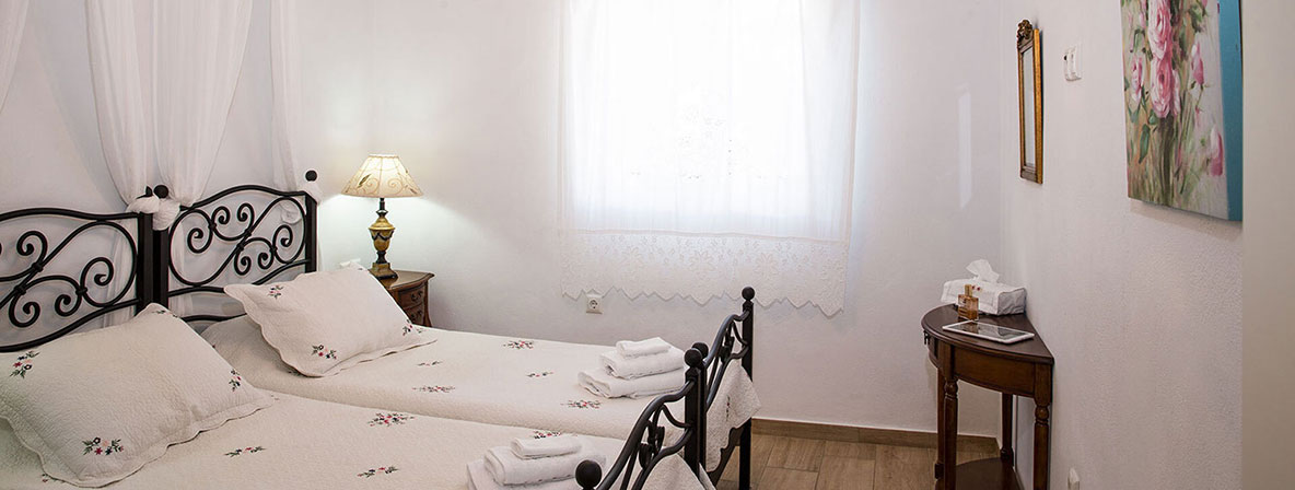 Chambre de la Villa Pelagos avec lits simples